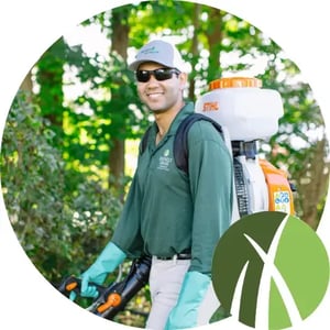 Friendly Mainely Grass technician ready to provide mosquito control service.